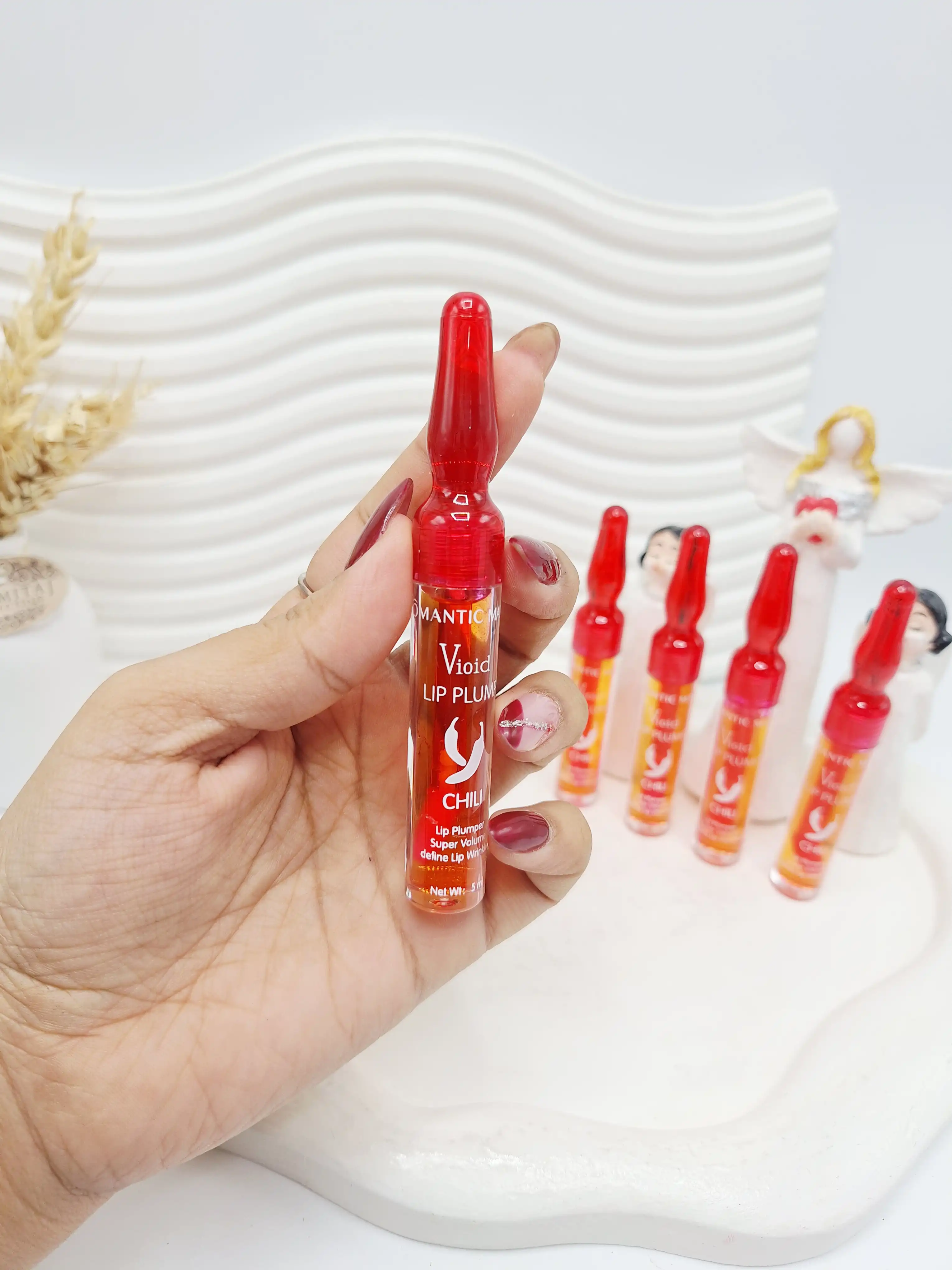 حجم دهنده لب فلفلی طرح آمپول برند ROMANTIC MATTE